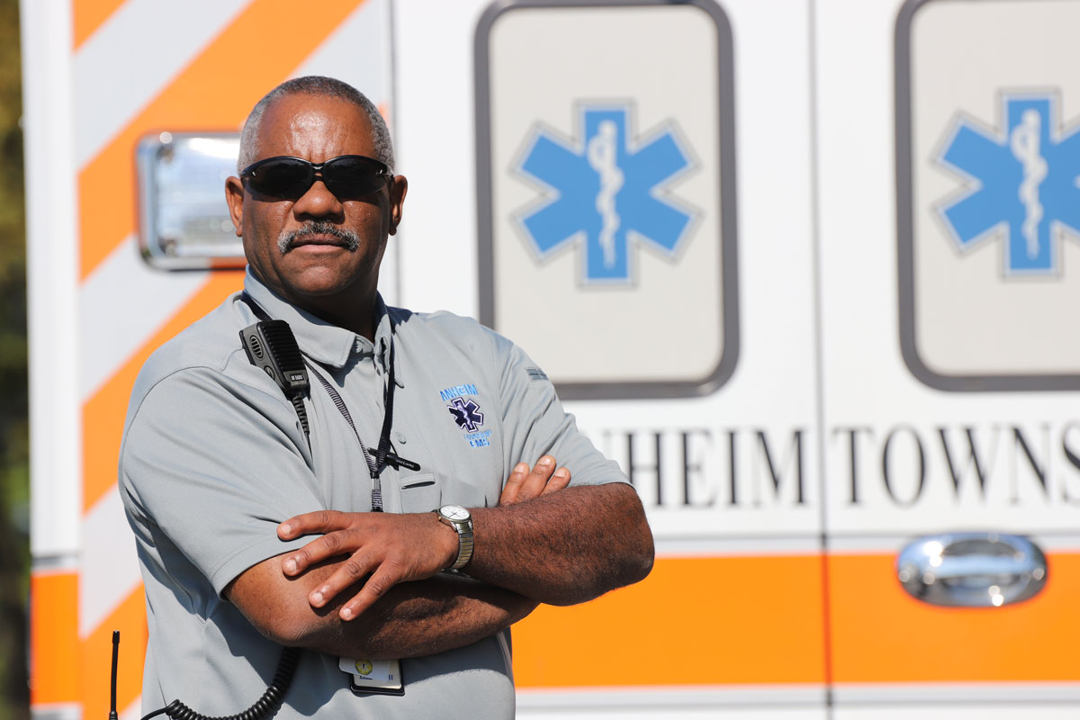 EMT standing beside an Ambulance